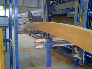 Wood gluelam beam being processed