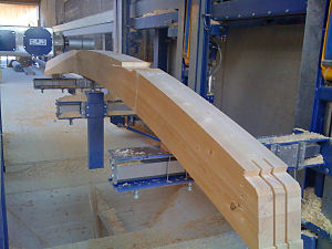 Wood gluelam beam processed by Lignamatic