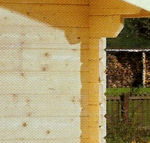 Rafter detail of milled log cabin